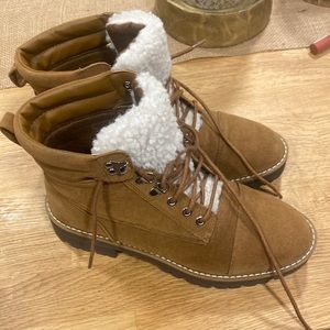 Brown hiker boots with wool tongue
